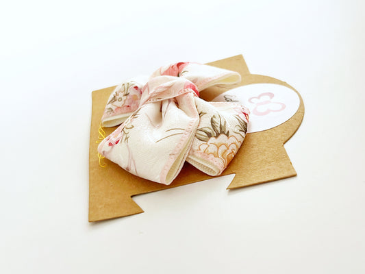 Blush white floral bow