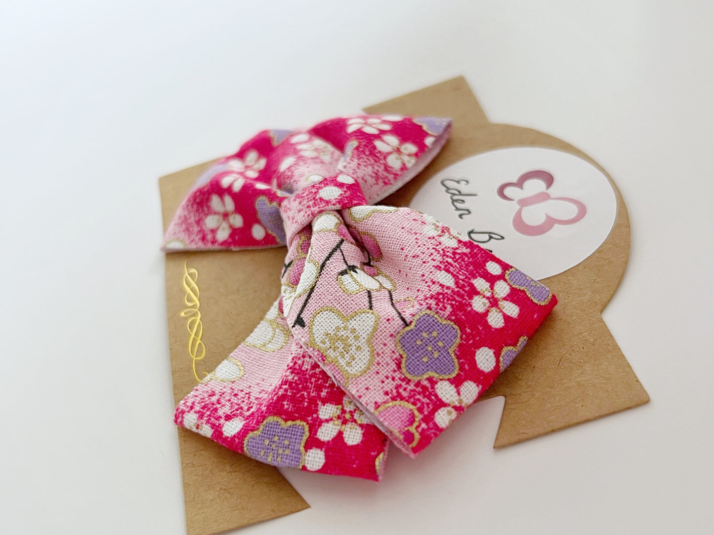 Magenta sakura flower bow