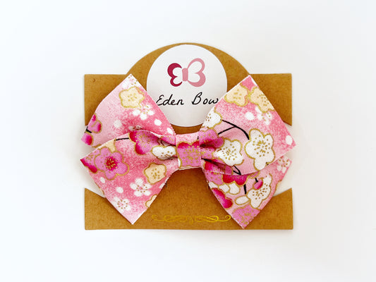 Pink sakura flower bow