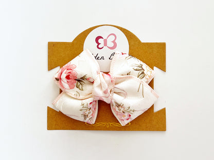 Blush white floral bow