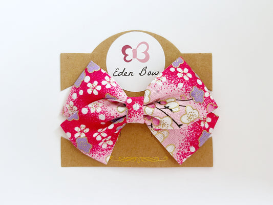 Magenta sakura flower bow