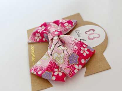Magenta sakura flower bow