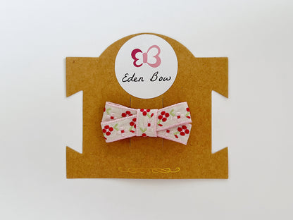 Pink woven flower bow