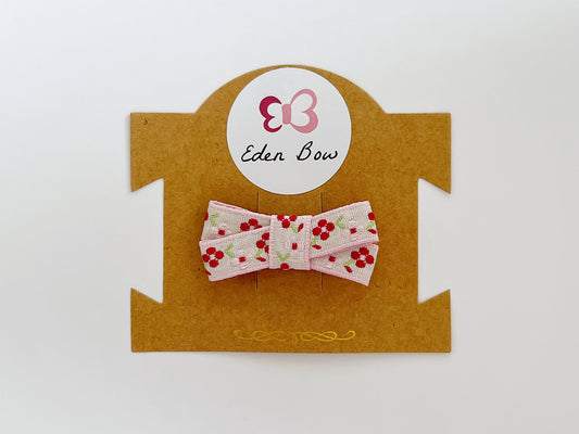 Pink woven flower bow