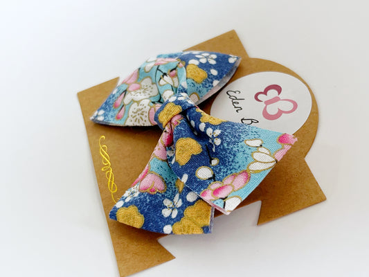Blue sakura flower bow