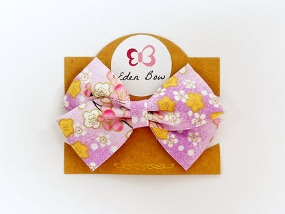 Lavender sakura flower bow