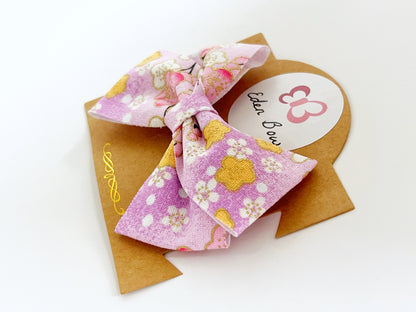 Lavender sakura flower bow